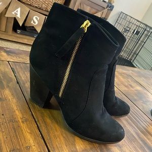 Black booties with gold hardware